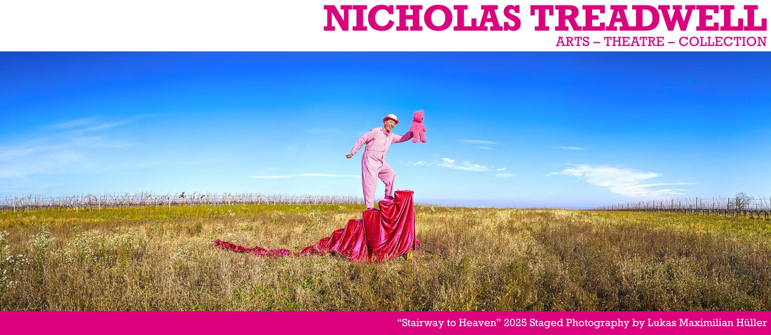 Nicholas Treadwell – Arts · Theatre · Collection. “Stairway to Heaven” 2025, staged photography by Lukas Maximilian Hüller: a man in a pink striped overall stands on a red velvet podium in a vineyard field, holding up a pink teddy bear.